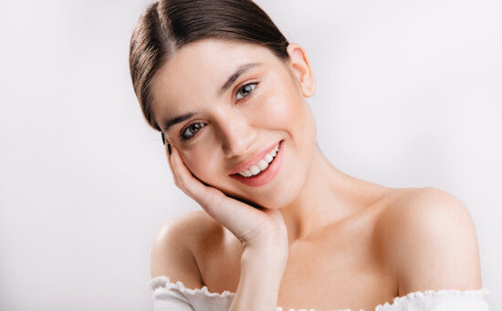 Portrait of smiling girl with healthy skin